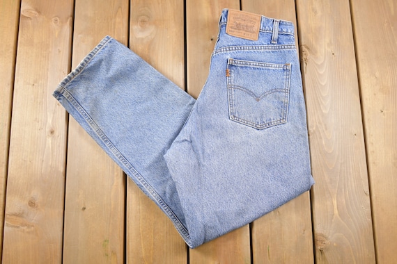 Vintage 1980s Levi's 550 Orange Tab Denim Jeans S… - image 1