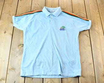 Vintage 1990s Light Blue With Colorful Embroidered Sleeves Hawaiian Island Souvenir Polo Shirt / Made In USA / American Vintage