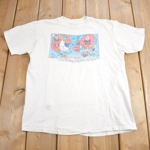 Vintage 1980s &quot;The World According To Ronald Reagan&quot; Graphic T Shirt / Vintage Reagan T Shirt / Graphic Tee / Single Stitch / Made In USA