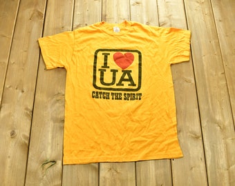 Vintage 1980s I Love UA "Catch The Spirit" T-Shirt Men's M / Graphic / 80s / 90s / Streetwear / Retro Style / Single Stitch / Made In USA