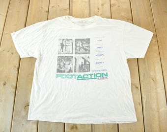 Vintage 1990s Foot Action Graphic T-Shirt / 90s Sportswear T Shirt / Graphic Tee / Single Stitch / Made In USA / Mens XL