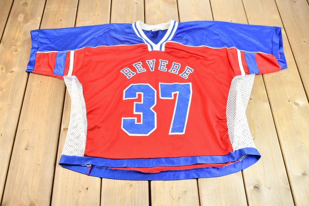 Vintage 1990s Cropped Fit Revere High School Mesh Football Vintage 1990s Cropped Fit Revere High School Mesh Football