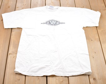 T-shirt graphique de football Fila pour femme vintage des années 1990 / Graphique / Années 80 / 90 / Streetwear / Style rétro / T-shirt Fila des années 90 / Fabriqué aux États-Unis