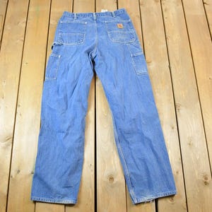Vintage 1990s Carhartt Loose Fit Denim Work Jeans Size 34 x 34 / 90s Carpenter Pants / Made In USA / Distressed Carhartt / Vintage Workwear
