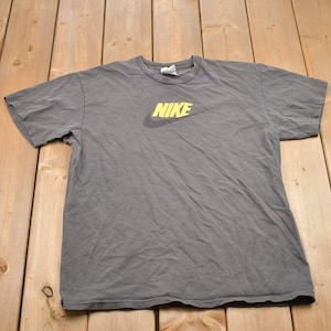 Vintage 1990s Nike Logo T-Shirt / 90s / Streetwear / Vintage Athleisure / Brand and Logo / Single Stitch / Made In USA
