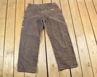 Pantalones de trabajo Carhartt marrones de mezclilla, estilo vintage de los 90, talla 38 x 30 / Pantalones de carpintero de los 90 / Hechos en EE. UU. / Estilo Carhartt desgastado / Ropa de trabajo vintage
