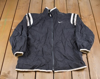 Vintage 1990s Kids Nike Swoosh Embroidered Windbreaker Jacket / Team Logo / Athletic Spring Summer Sportswear / Streetwear / Athleisure