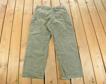 Vintage 2000s Carhartt Distressed Sun Faded Carpenter Pants Men's 34 x 30 / Y2K Carpenter Pants / Workwear / Dungarees