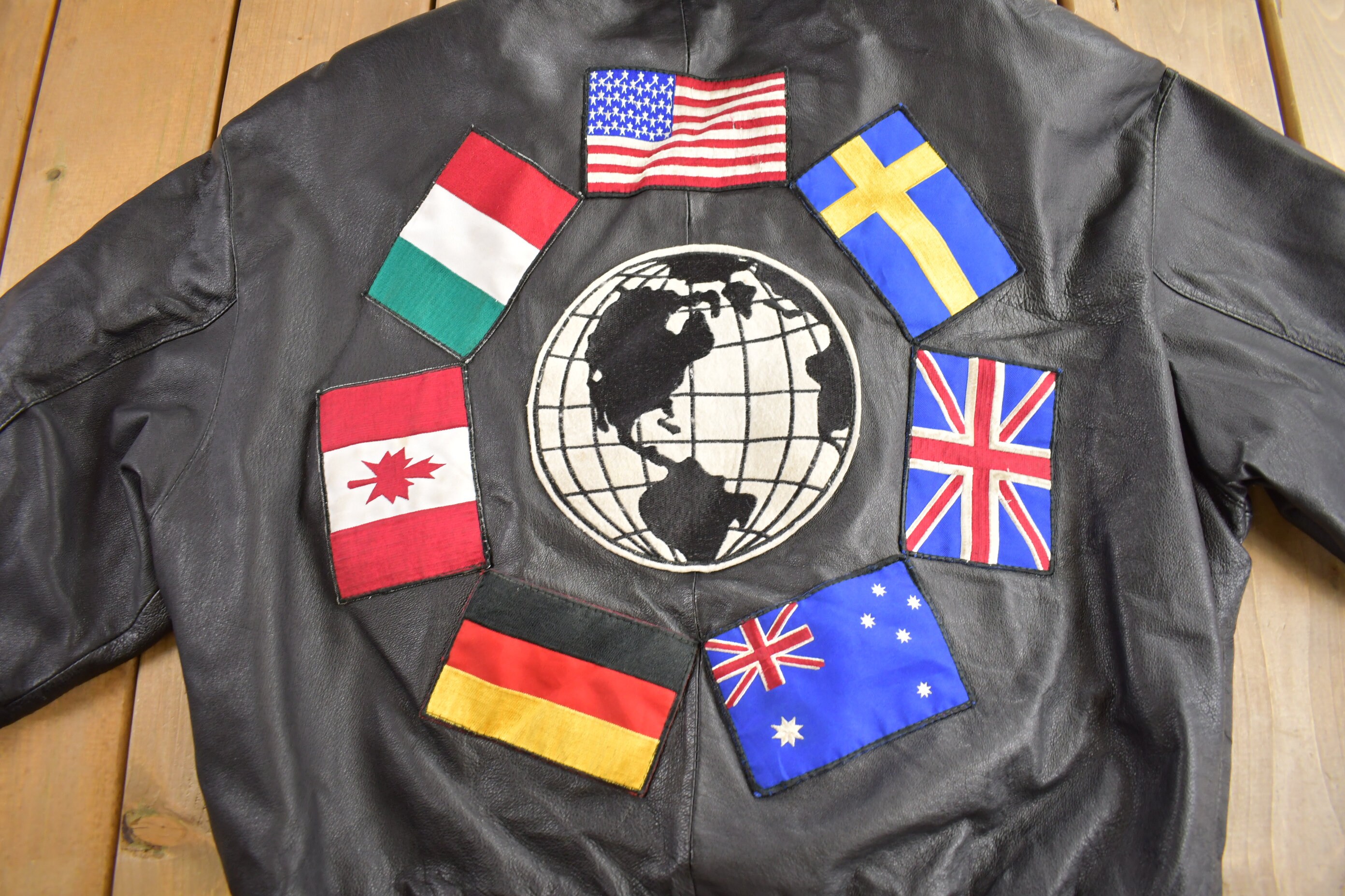 Vintage 1990s World Flags Patchwork Leather Jacket / Embroidered