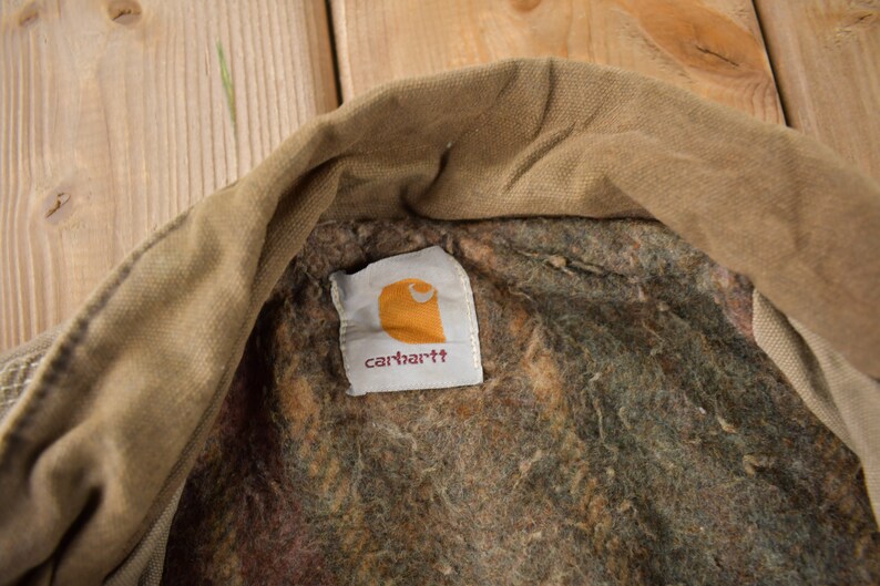 Vintage 1990s angustiado Carhartt manta forrada chaqueta de campo hecha en EE.UU. tamaño XXL imagen 5
