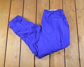 Vintage 1990s Wilson Blue Track Pants Size Large / Windbreaker Bottoms / Lightweight / Athletic Streetwear / Splash Pants