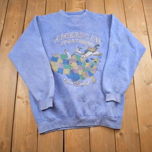 Vintage 1990er Jahre amerikanischer Sportler Migratory Corridors Souvenir Travel Crewneck Sweatshirt