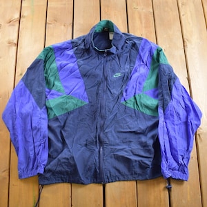 Vintage 1990s Nike Embroidered Windbreaker Jacket / Mini Swoosh / Spring Summer Sportswear / Color Block / Athleisure / 90s Nike