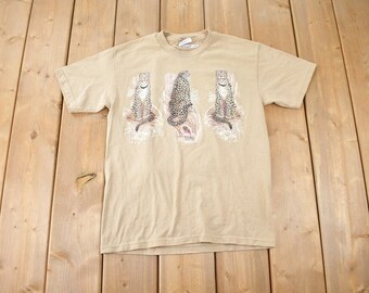 T-shirt beige graphique Hanes Cheetah vintage des années 1990, fabriqué aux États-Unis, taille S