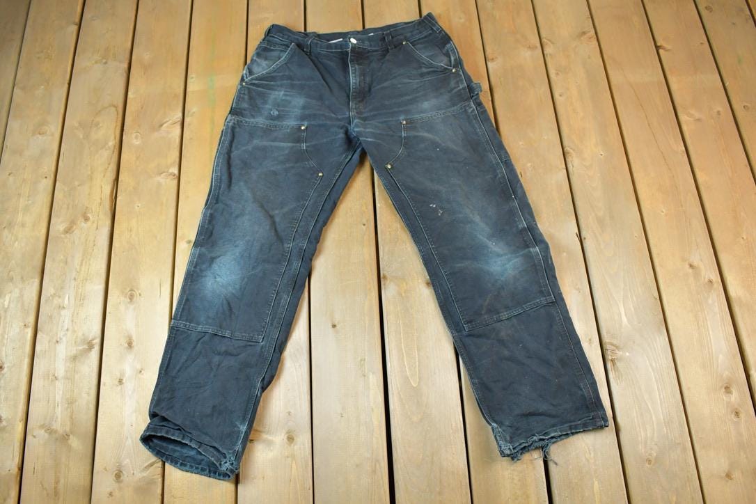 Vintage 1990s Carhartt Work Denim Pants Size 34x32 / 90s Carpenter