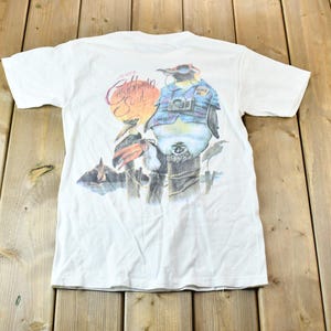 Vintage 1990s Jimmy Buffett&#39;s Caribbean Soul Tourist Penguin Souvenir Single Stitch Graphic T-Shirt / Made In USA / American Vintage