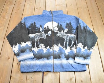 Vintage 1990s Alaska Embroidered Moose All Over Print Fleece Sweater