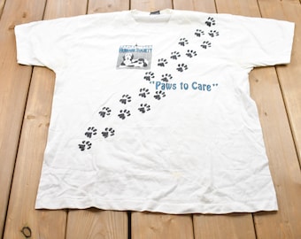 Vintage 1990s Paws To Care Humane Society Graphic T-Shirt / Graphic / 80s / 90s / Streetwear / Retro Style / Single Stitch / Made In USA