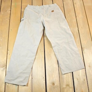 Vintage 1990s Tan Carhartt Denim Work Jeans Size 32 x 24 / 90s Carpenter Pants / Made In USA / Distressed Carhartt / Vintage Workwear
