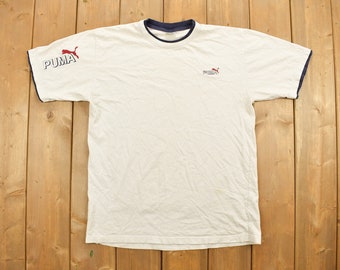 PUMA Amg Petronas Essentials Car Graphic Tee in White for Men