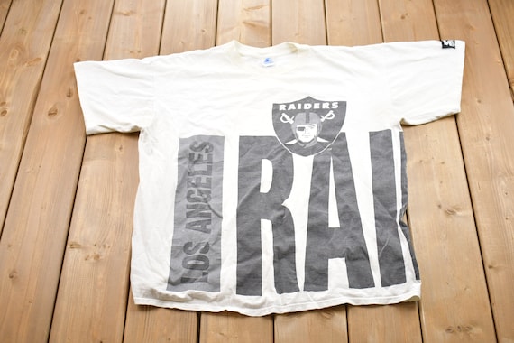 Vintage 1990s Starter Los Angeles Raiders NFL Graphic T-shirt