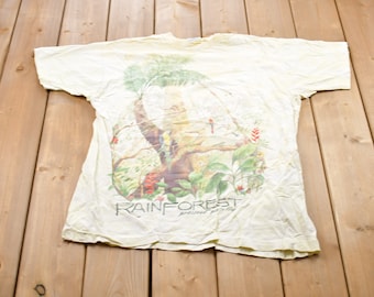 Maglietta grafica vintage Preserve Paradise Rainforest Liquid Blue degli anni '90 / Grafica / Streetwear / Stile retrò / Punto singolo / Prodotta negli USA