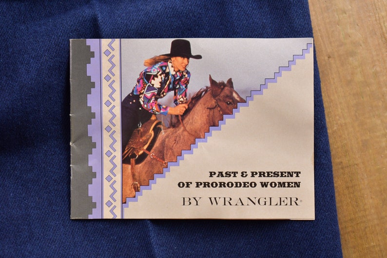 May include: A brochure with a woman in a cowboy hat riding a horse. The brochure is titled "Past & Present of ProRodeo Women by Wrangler."