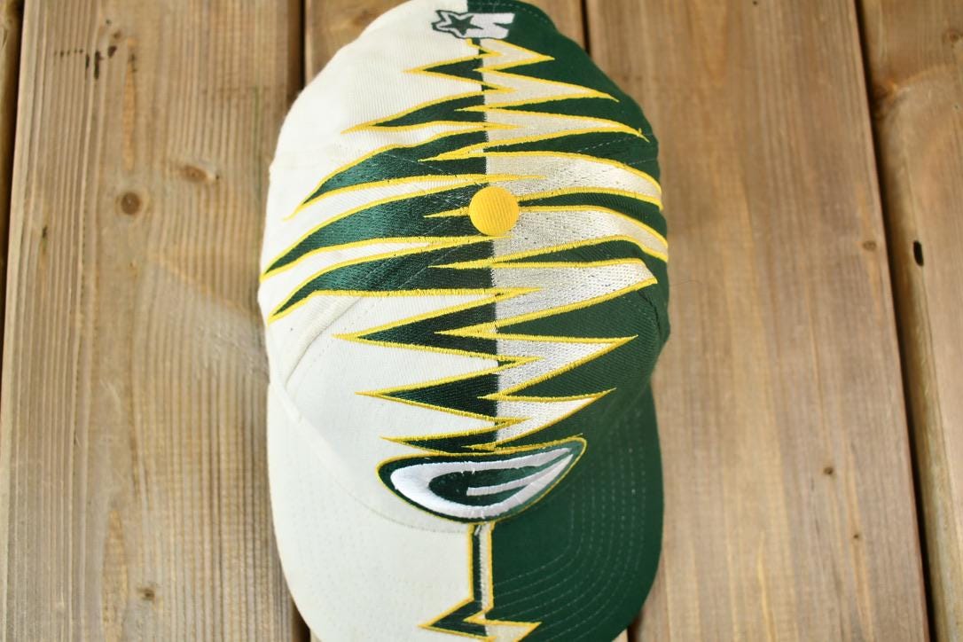 90s レア グリーンベイパッカーズ ウェア #4 ウィルソン Vintage 1990s Green Bay Packers NFL Starter Shock Wave Strap