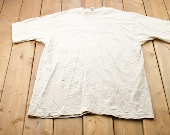 Vintage 1990s Fruit Of The Loom Graphic T-Shirt / Graphic / 80s / 90s / Streetwear / Retro Style / Beige / Made In USA
