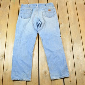 Vintage 1990s Carhartt Denim Work Jeans Size 38 x 32 / 90s Carpenter Pants / Made In USA / Distressed Carhartt / Vintage Workwear