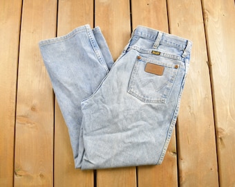 Vintage 1980s Wrangler Jeans Size 34 X 27.5 / Light Wash / 80s Denim / Made in USA / American Vintage / Workwear / Streetwear / Pants