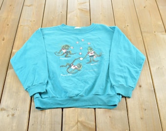Sudadera vintage de los años 80 con estampado de lagarto y cuello redondo, ideal como recuerdo para jóvenes (talla L) / Sudadera con estampado de los años 90 para turistas / Hecha en Canadá