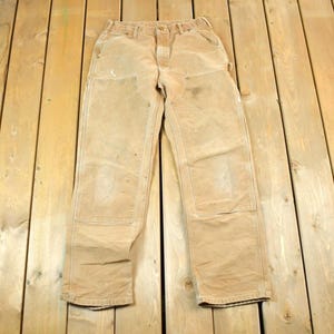Vintage 1990s Carhartt Double Knee Tan Denim Work Jeans Size 33 x 34 / 90s Carpenter Pants / Made In USA / Distressed Carhartt / Dungaree