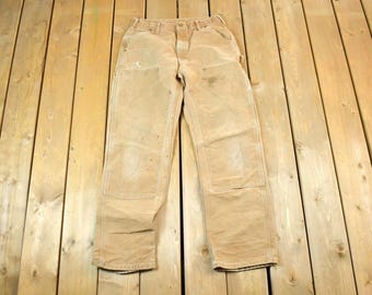 Vintage 1990s Carhartt Double Knee Tan Denim Work Jeans Size 33 x 34 / 90s Carpenter Pants / Made In USA / Distressed Carhartt / Dungaree
