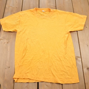 Vintage 1980s Screen Stars Blank Yellow T-Shirt / Streetwear / Retro Style / Single Stitch / Made In USA / Vintage Basics / 80s Graphic Tee