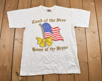 Vintage 1990s Land of the Free Graphic T Shirt / Vintage T Shirt / Streetwear / Graphic Tee / Made In USA