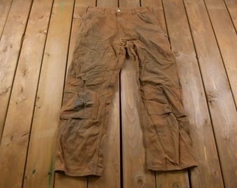 Vintage 1990s Carhartt Double Knee Heavily Distressed Work Pants Size 31 x 29 / 90s Carpenter Pants / Made In USA / Distressed Carhartt