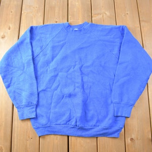 Vintage 1990s Blank Fruit Of The Loom Crewneck Sweatshirt / Raglan / Blue / Made in USA / 90s Crewneck / Essential / Streetwear / 90s