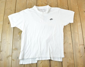 Polo Nike vintage de los años 90 con botones bordados de un cuarto / Swoosh original / Swoosh Nike / Nike Vintage / Swoosh pequeño / Swoosh grande / Cuadros Nike