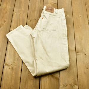 Vintage 90&#39;s Levi&#39;s 550 Orange Tab Jeans Size 31 x 34 / Streetwear Fashion / Relaxed Fit / Tapered Leg / Made In USA / Vintage Levi&#39;s