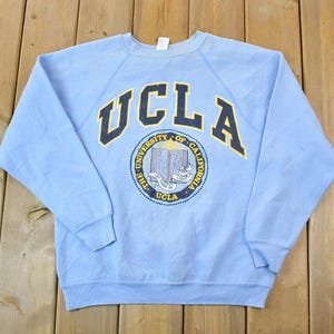 Vintage 1990s UCLA University Of California Collegiate Crewneck / Embroidered / NCAA Sweatshirt / Sportswear / Americana / Baby Blue