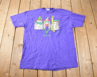 Camiseta vintage Ski Tahoe Travel dos anos 90, fabricada nos EUA, tamanho XL.