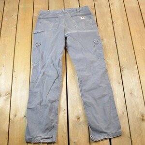 Vintage 1990s Carhartt Denim Lined Work Jeans Size 36 x 36 / 90s Carpenter Pants / Made In USA / Distressed Carhartt / Vintage Workwear
