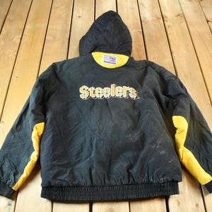 May include: Black and yellow hooded jacket with the word "Steelers" in yellow lettering on the back.