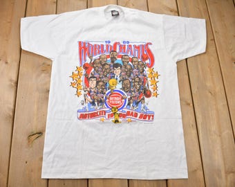 ヴィンテージ 1989 デトロイト ピストンズ NBA ワールドチャンピオン ビッグヘッド グラフィック Tシャツ / アメリカ製 / シングルステッチ / NBA バスケットボール / モーターシティ バッドボーイズ