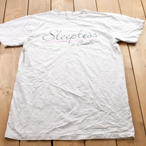 Vintage 1990s Sleepless In Seattle Graphic T-Shirt /  80s / 90s / Streetwear Fashion / Made In USA / Vacation Tee / Travel & Tourism