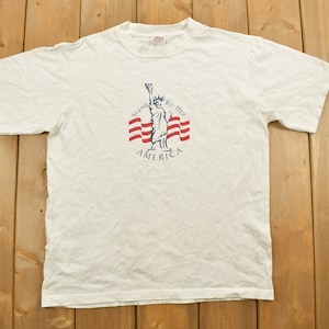 Vintage 1990s Statue Of Liberty Stand By Her Graphic T Shirt / 90s / New York / Streetwear / Patriot / Essential / Travel / Anvil