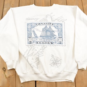 Sudadera vintage de cuello redondo de Nueva Escocia, años 90, con diseño de Blue Nose Boat, Canadá. Sudadera de cuello redondo de los años 90, de recuerdo, ropa de calle, viajes y vacaciones.
