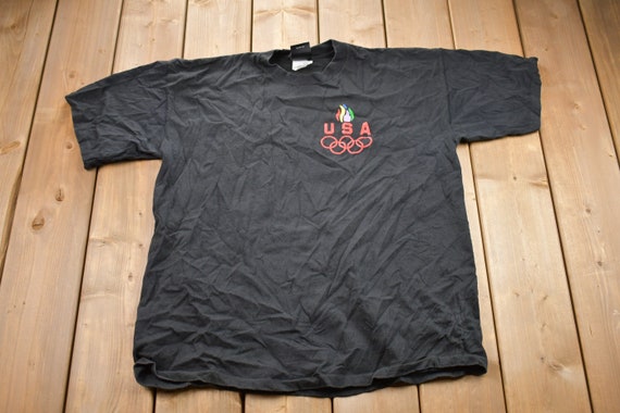 Vintage 1990s USA Olympics JC Penney Graphic T-shirt Vintage 1990s USA Olympics JC Penney Graphic T-shirt