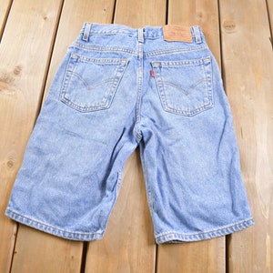 Vintage 1990s Levi 550 Red Tab Jean Shorts Size 26 x 10 / 1990s Shorts / Streetwear Fashion / Bottoms / Light Wash / Vintage Jeans/ Jorts